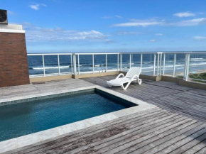 Apartamento pé na areia